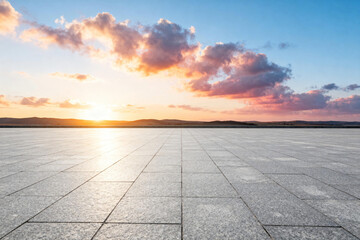 Sunset Over Empty Paved Plaza with Dramatic Sky