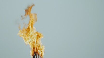 A fiery spectacle against a pale blue backdrop.