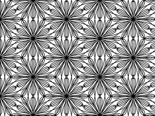 Symmetrical abstract design in black and white tones.