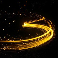 Obraz premium Golden Light Trails on Black Background with Twirling Lines and Sparks