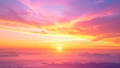 Vibrant sunrise paints the sky with hues of pink, orange, and gold.