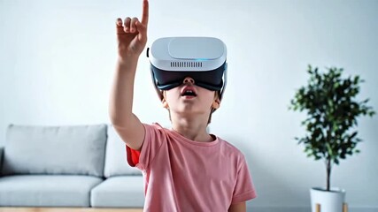Child boy wearing VR headset at home, metaverse virtual reality game play - Powered by Adobe