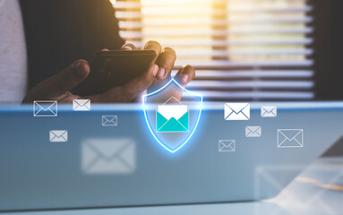 Secure email communication concept, shield protection icon over smartphone, representing encrypted messages, phishing prevention, cybersecurity awareness, data privacy, modern business digital users