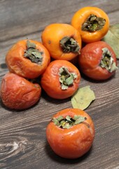  persimmons, orange cherries, autumn fruits, fruits full of vitamins, ripe fruits