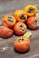  persimmons, orange cherries, autumn fruits, fruits full of vitamins, ripe fruits
