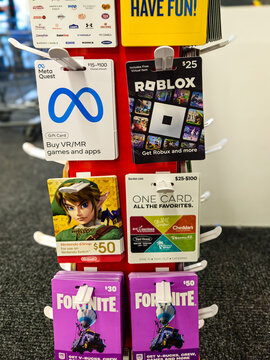 A retail store display of various gift cards for holidays or general gifting, including Meta, Roblox, Fortnite, and more. (Missouri , USA - Dec. 24, 2025). Editorial Use Only.