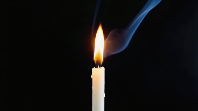 A candle flame forming the shape of a heart for one second 4K