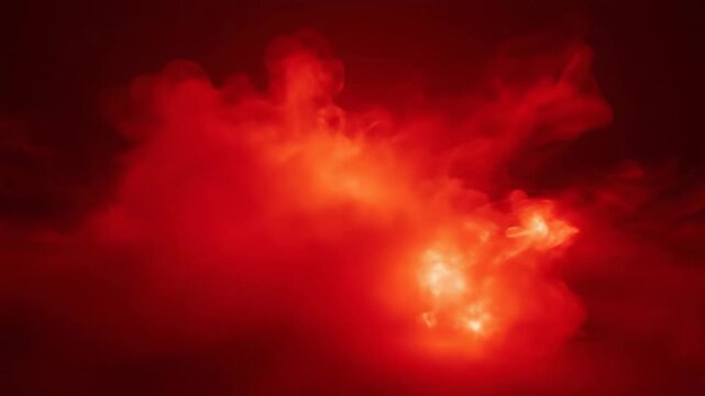 Abstract red cloud formations against dark backdrop creating dramatic visual