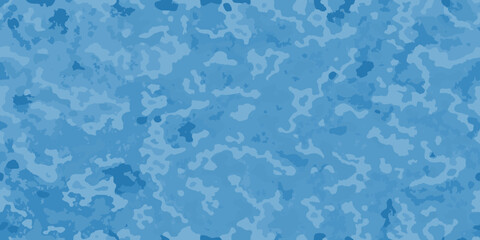 Abstract blue camouflage pattern with irregular shapes and varying shades © Asit