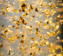 Luxury transparent cream gel with sparkling 24k gold floating particles serum, beauty products, wellness ads, cosmetic presentations. Skin care, face creme, mask, body lotion, moisturizer. Closeup