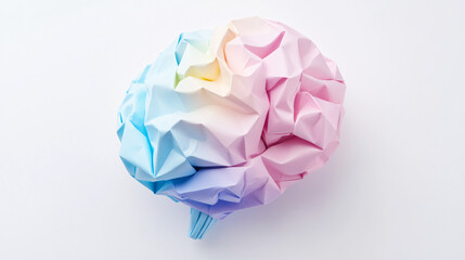 A colorful paper brain sculpture on a white background symbolizing creativity and imagination