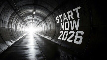 A bright light at the end of a dark tunnel with the text 'START NOW 2026' on the wall, symbolizing new beginnings and progress