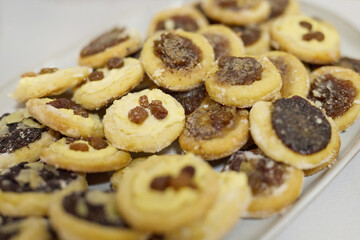 Various detail of wedding decorations, cookies, cakes, flowers and arranges