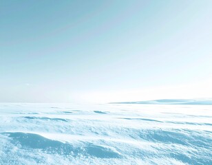 Obraz premium Arctic Landscape Under Clear Blue Sky with Snow Covered Ground