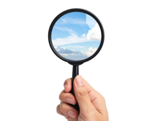 Hand Holding Magnifying Glass Isolated on Transparent Background