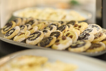 Various detail of wedding decorations, cookies, cakes, flowers and arranges