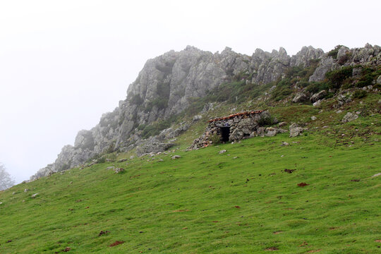 Stone shepherd hut used by mountain pastors along the Camino de Santiago Route Napol&eacute;on in the Pyrenees, photographed in July 2024.