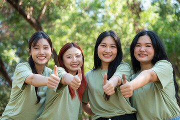 Thumbs Up Positivity: A group of smiling people giving thumbs up. Expressing happiness, approval, and optimism. A positive and cheerful portrait of collaboration and unity.