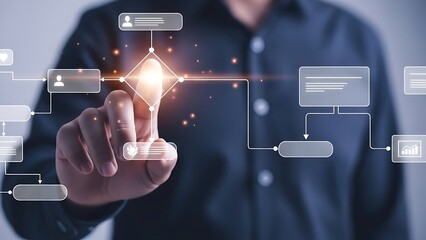 Digital transformation and workflow automation concept with businessman touching a glowing flowchart diagram on a virtual interface