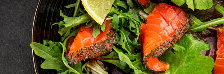 Salmon salad green leaf salad seafood main course ingredient appetizer fresh tasty gourmet food background on the table rustic food top view copy space vegetarian food pescetarian diet