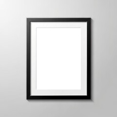 Minimalist blank framed poster hanging on a gray wall with white mat.