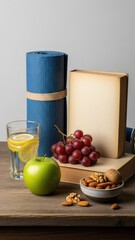Healthy lifestyle essentials on wooden table with yoga mat