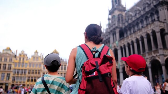 tourist, smartphone, ghent, belgium, travel, architecture, woman, backpack, outdoors, canal, flower, city, urban, exploring, navigation, technology, mobile, destination, summer, vacation, trip, europe