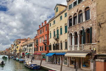 Fototapeta premium Cityscape with canal in Venice, Italy