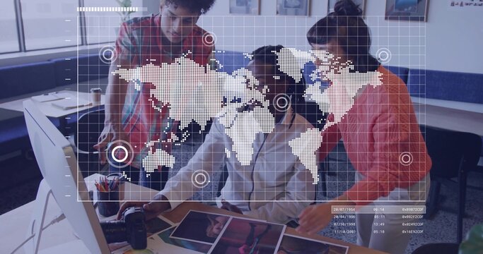 Reviewing team leaning over desk pointing at prints in office, red sweater, headphones, DSLR HUD - Powered by Adobe