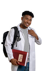 A confident medical student, wearing a lab coat, carrying a backpack, and holding a book.