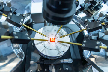 silicon wafer with needles for test of semiconductor on the probe station,examining a sample of microchip transistor