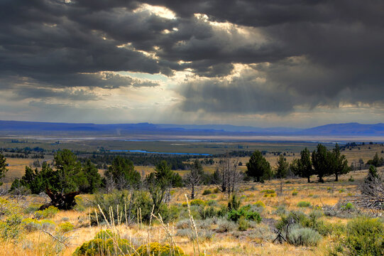 Light Breaks Through Storm Clouds - Powered by Adobe