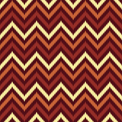 Jagged Line Geometric Ornament in Red, Yellow, Brown Seamless Pattern