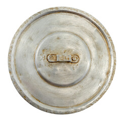Old worn metal frying pan lid on a white background. Top view.