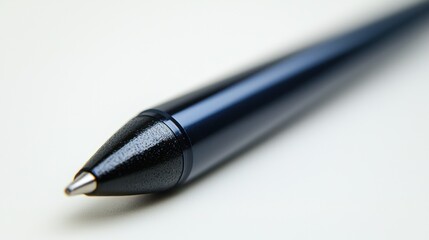 Close-up of blue pen tip on white background; writing, office supplies