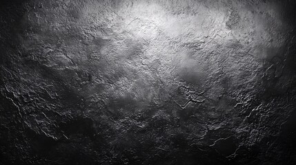Dark textured concrete wall with subtle light and shadow effect