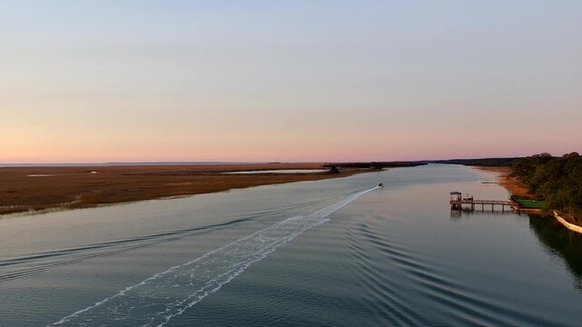 Drone clip of slow ascension over the intercostal waterway in South Carolina just before sunrise.
