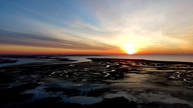 Drone clip of slow ascension over the intercostal waterway in South Carolina just before sunrise.