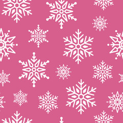 Pink winter seamless pattern with white snowflakes for festive holiday wrapping