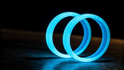 Blue glowing rings with swirl motion isolated with shadows on white background. AI GENERATED.
