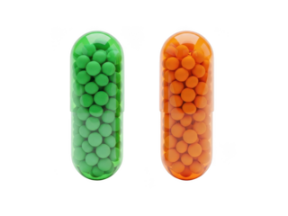 Green and orange capsules isolated on transparent background