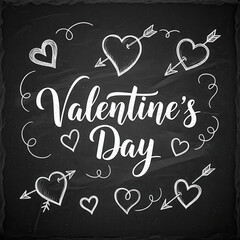 Handwritten Valentine day message with hearts and arrows on chalkboard