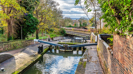 A view at towards a lock gate on the Shropshire Union Canal in the city of Chester, Cheshire, UK