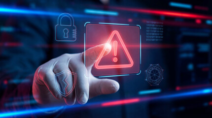 Digital security alert with hand touching warning symbol, representing cybersecurity threats and protection measures in modern technological environment