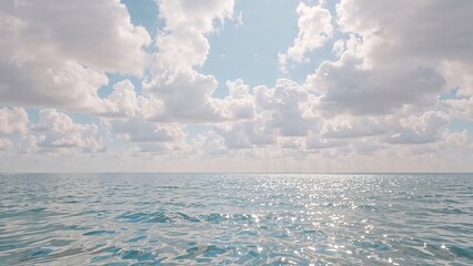 Calm ocean under cloudy sky with sunlight reflections on the water surface. Nature and landscape scene. The scene of the sea and sky.