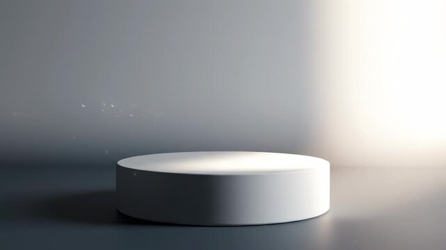 Abstract motion graphic animation featuring a static cylindrical podium softly illuminated by a slow transitioning light beam across a seamless gray to white wash display, showroom, elegant