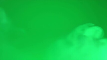 Green background with smoke or fog effect on the left side slowly moving right - Powered by Adobe