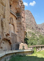 Naklejka premium The Great Maitreya Buddha carved into Jishi Mountain wall at Bingling Temple Grottoes in Yongjing County, Gansu Province of China