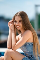 Radiant Lady Enjoying Sunny Day, Cheerful Female Model With Long Hair In Casual Wear Outdoors