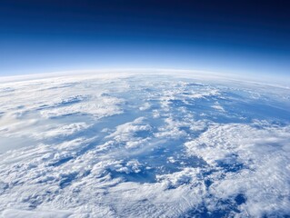 View of clouds and Earth from high above the atmosphere during daylight